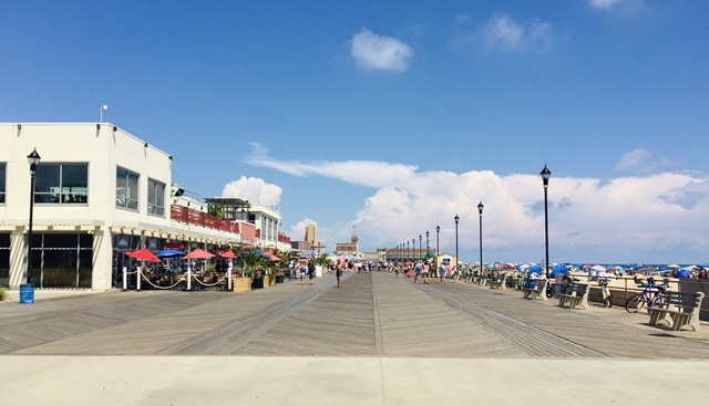 This is a photo of a boardwalk on the Jersey Shore. stop getting hammedred by life